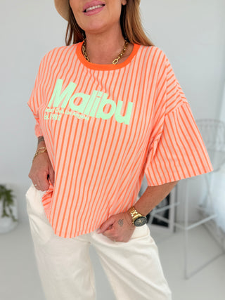 Gestreifte T-Shirt in Neonorange-Orange vor mit Schaumprint in Mint